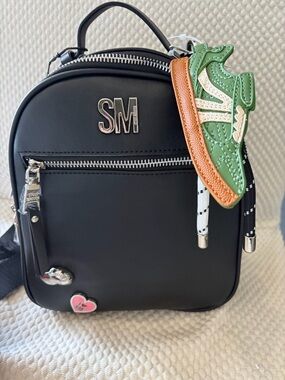 Steve Madden Raven Black Women's Backpack with Sneaker Charm and Monogram Straps
